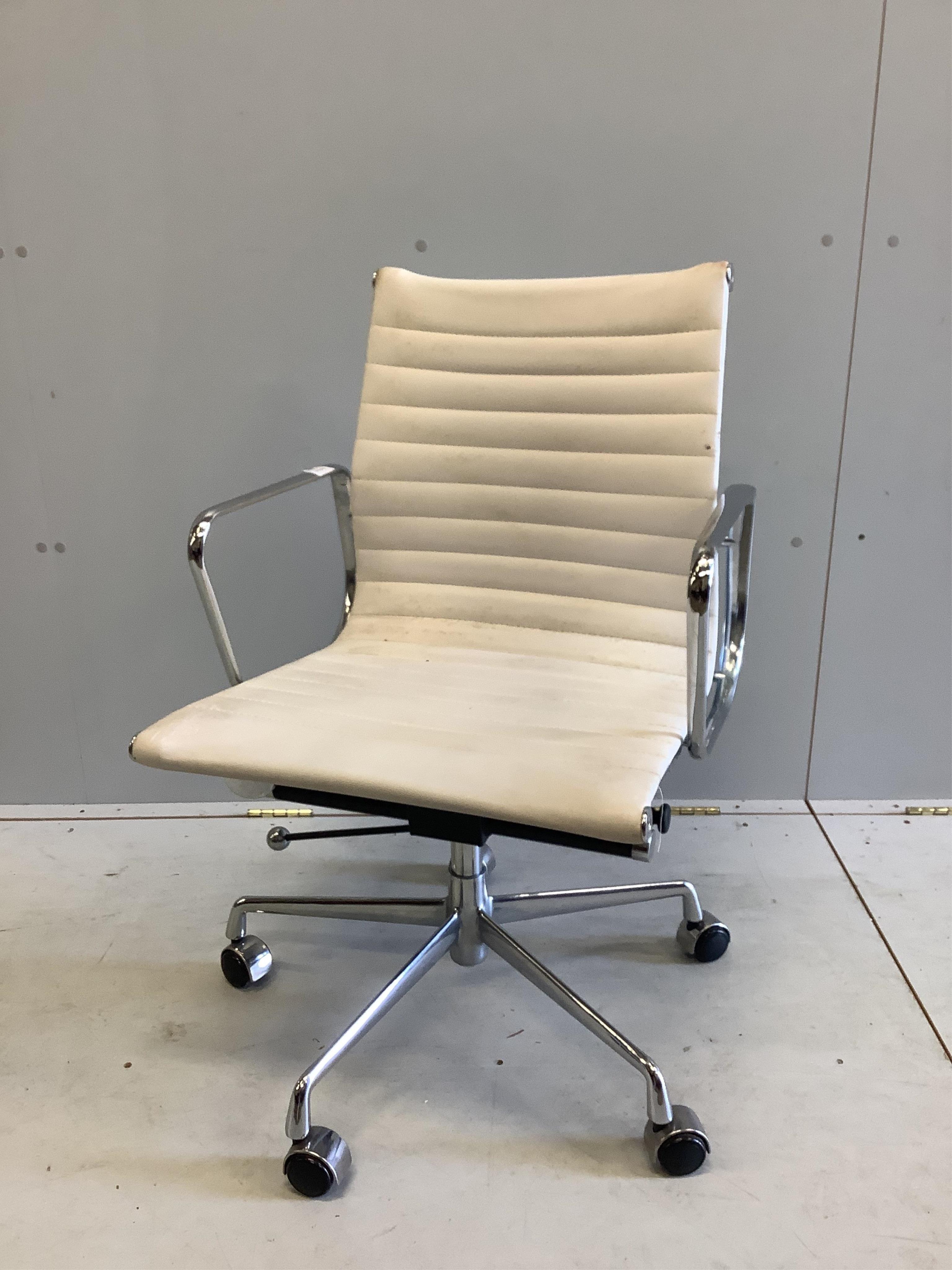 A Vitra Eames white desk chair, width 56cm, depth 50cm, height 98cm. Condition - fair